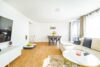 Sofortbezug! - Charmante 2-Zimmer-Wohnung mit großer Terrasse in ruhiger Lage - Wohnzimmer
