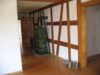 Historisches Gebäude mit Ausbaupotential - Flur mit Kachelofen - Wohnung
