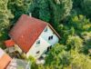 Charmantes Einfamilienhaus, ruhig gelegen, mit idyllischem Garten und gemütlicher Erdterrasse - Luftbildaufnahme