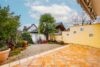 Attraktives Reihenendhaus als Generationenhaus – mit schönem Garten und umfangreichen Modernisierungen - Terrasse / Gartenansicht