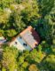 Charmantes Einfamilienhaus, ruhig gelegen, mit idyllischem Garten und gemütlicher Erdterrasse - Luftbildaufnahme