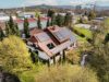 Großzügiges Wohnhaus mit Gewerbeeinheit, 1.788 m² Traumgrundstück & Gartenidylle mit Teich - Drohnenaufnahme