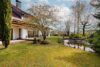 Großzügiges Wohnhaus mit Gewerbeeinheit, 1.788 m² Traumgrundstück & Gartenidylle mit Teich - Garten