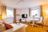 Attraktive Kapitalanlage: 3-Zimmer-Erdgeschosswohnung mit Balkon - Wohnzimmer