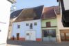 Innenstadtgrundstück mit 2 Häusern und Gewerbeeinheit, teilweise leerstehend - Ansicht Kronengasse mit Garage